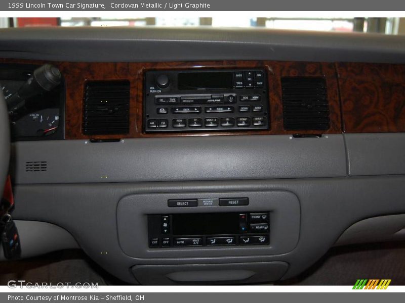 Cordovan Metallic / Light Graphite 1999 Lincoln Town Car Signature