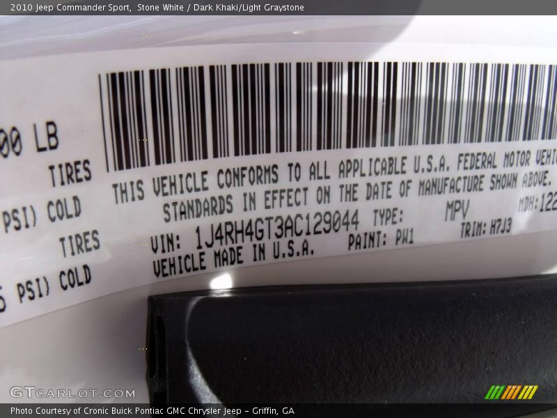 Stone White / Dark Khaki/Light Graystone 2010 Jeep Commander Sport