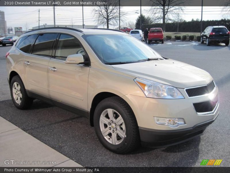 Gold Mist Metallic / Ebony 2010 Chevrolet Traverse LT AWD