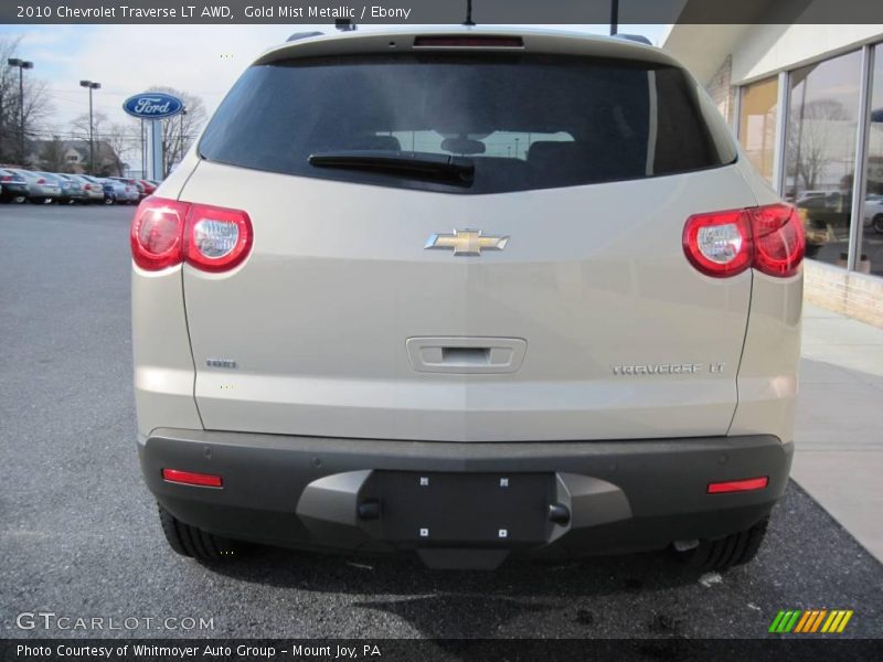 Gold Mist Metallic / Ebony 2010 Chevrolet Traverse LT AWD