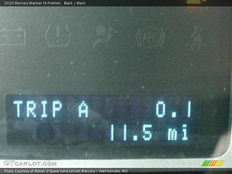 Black / Black 2010 Mercury Mariner I4 Premier