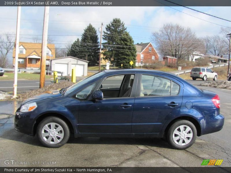 Deep Sea Blue Metallic / Beige 2009 Suzuki SX4 Sedan LE AWD