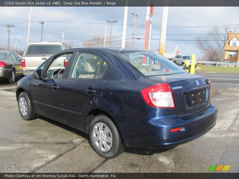 Deep Sea Blue Metallic / Beige 2009 Suzuki SX4 Sedan LE AWD