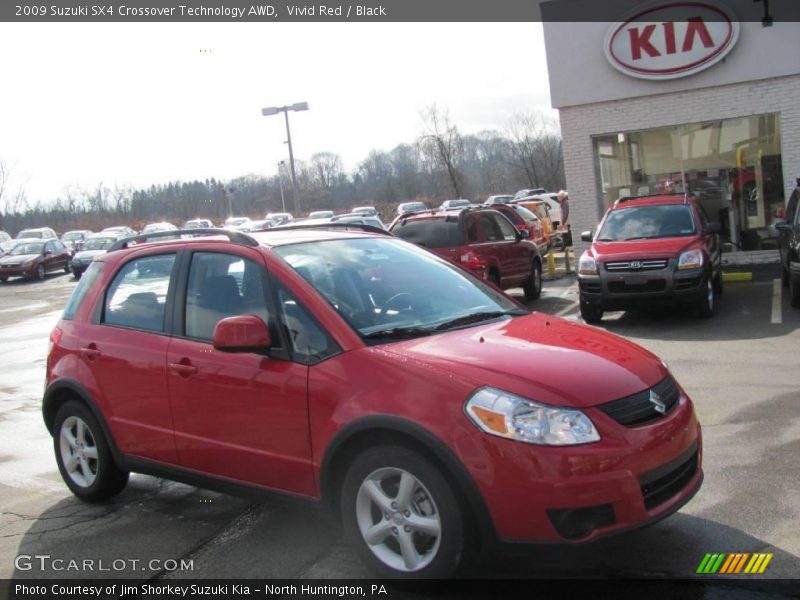 Vivid Red / Black 2009 Suzuki SX4 Crossover Technology AWD