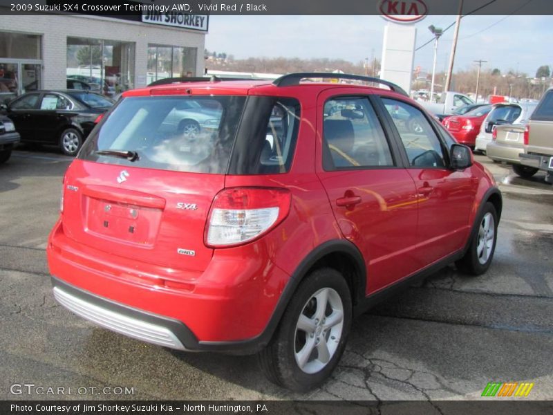 Vivid Red / Black 2009 Suzuki SX4 Crossover Technology AWD