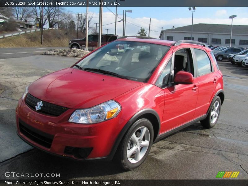 Vivid Red / Black 2009 Suzuki SX4 Crossover Technology AWD