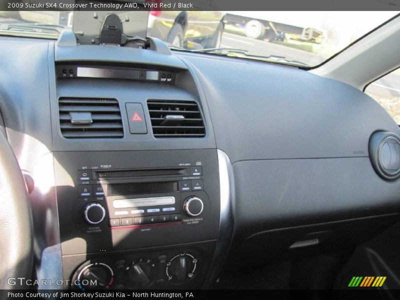 Vivid Red / Black 2009 Suzuki SX4 Crossover Technology AWD