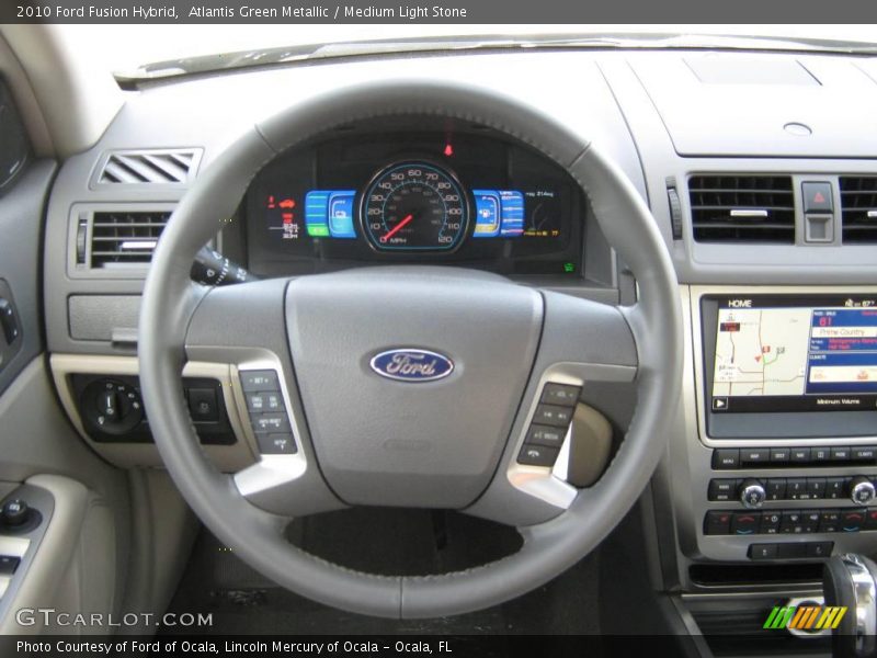 Atlantis Green Metallic / Medium Light Stone 2010 Ford Fusion Hybrid