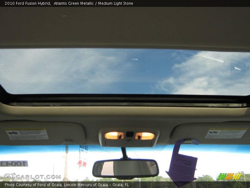 Atlantis Green Metallic / Medium Light Stone 2010 Ford Fusion Hybrid