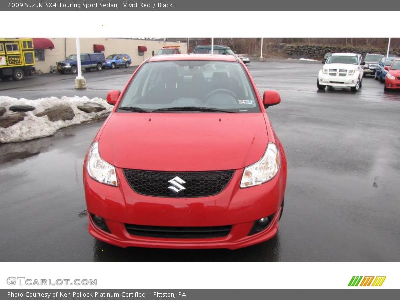 Vivid Red / Black 2009 Suzuki SX4 Touring Sport Sedan