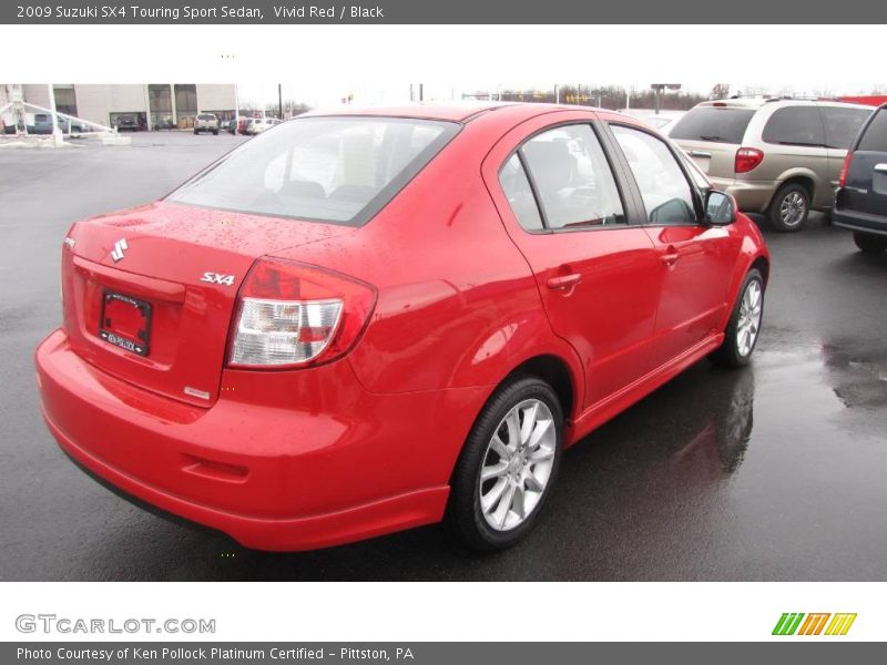 Vivid Red / Black 2009 Suzuki SX4 Touring Sport Sedan