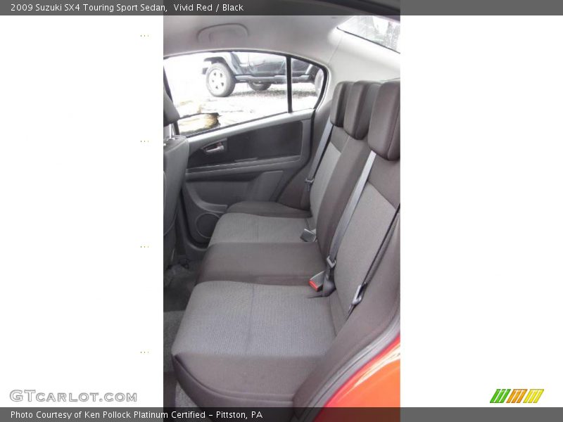 Vivid Red / Black 2009 Suzuki SX4 Touring Sport Sedan