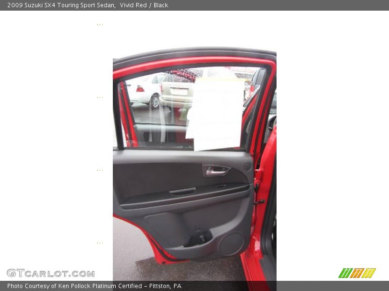 Vivid Red / Black 2009 Suzuki SX4 Touring Sport Sedan