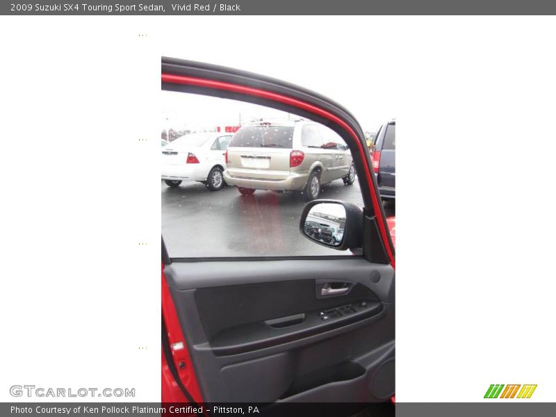 Vivid Red / Black 2009 Suzuki SX4 Touring Sport Sedan