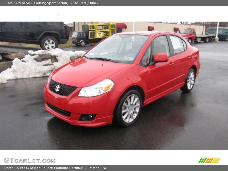 Vivid Red / Black 2009 Suzuki SX4 Touring Sport Sedan