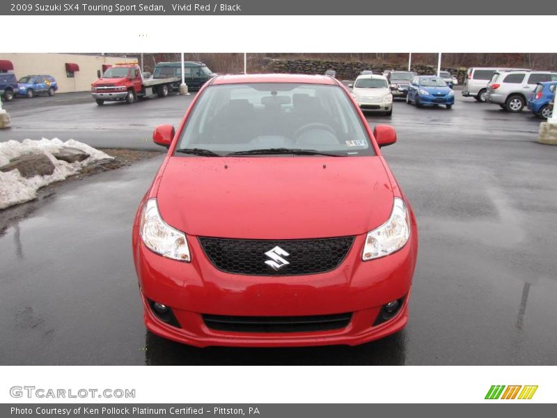 Vivid Red / Black 2009 Suzuki SX4 Touring Sport Sedan
