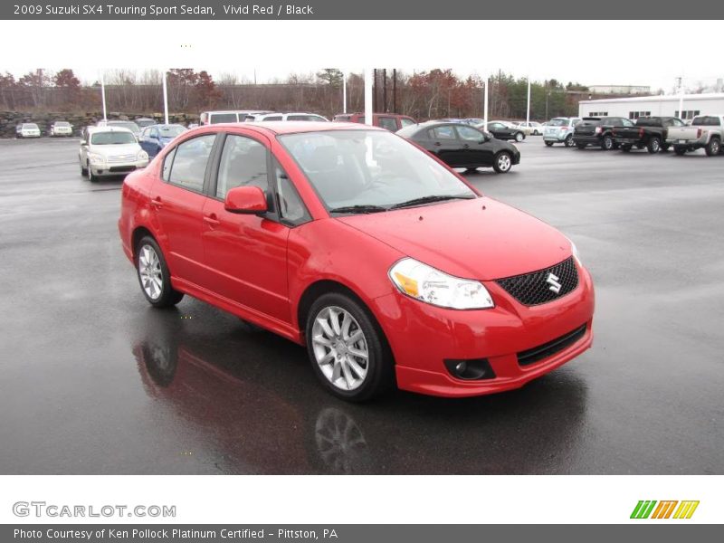 Vivid Red / Black 2009 Suzuki SX4 Touring Sport Sedan