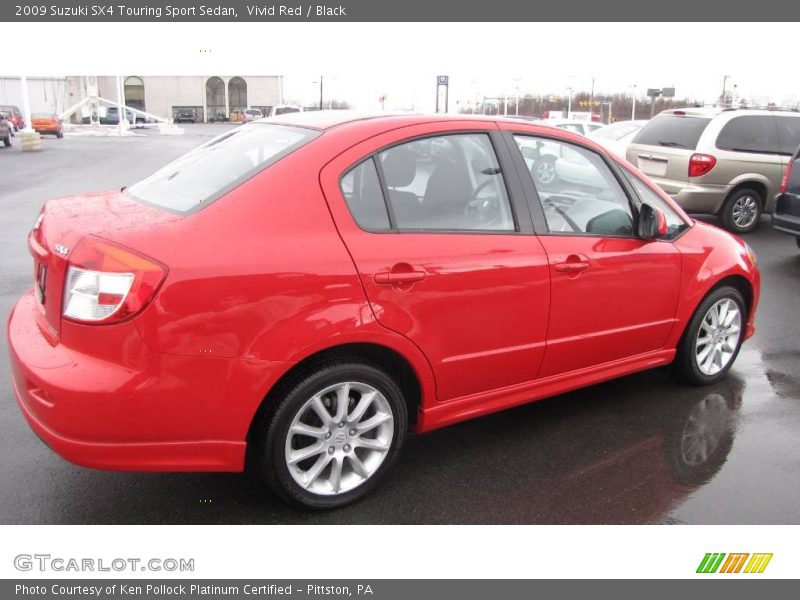 Vivid Red / Black 2009 Suzuki SX4 Touring Sport Sedan