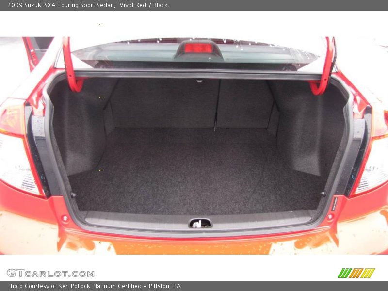 Vivid Red / Black 2009 Suzuki SX4 Touring Sport Sedan