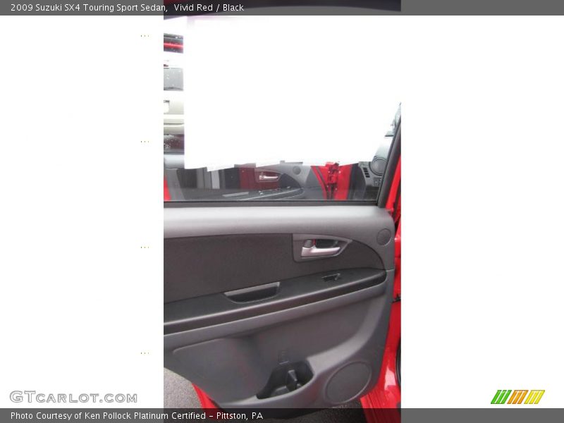 Vivid Red / Black 2009 Suzuki SX4 Touring Sport Sedan