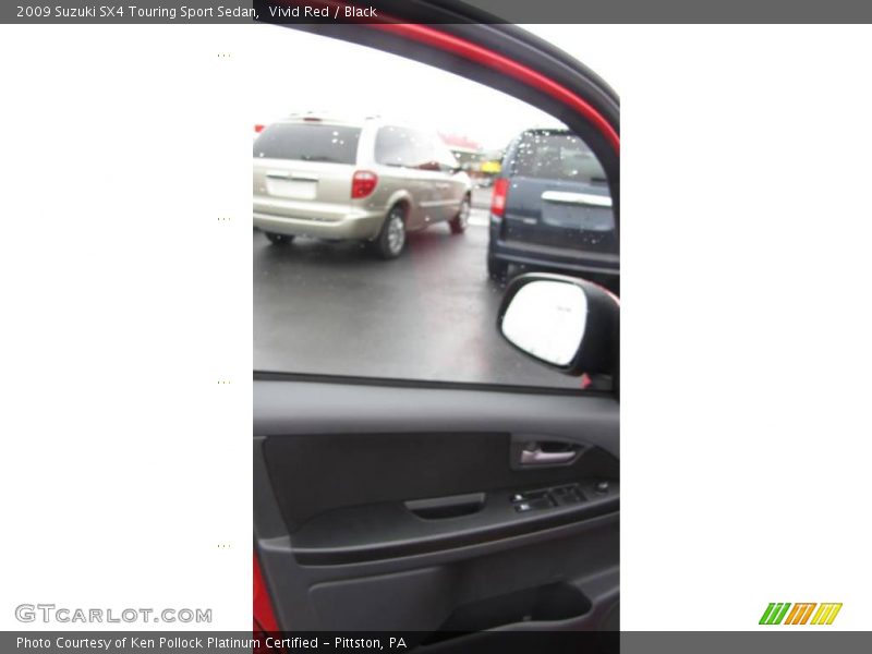 Vivid Red / Black 2009 Suzuki SX4 Touring Sport Sedan