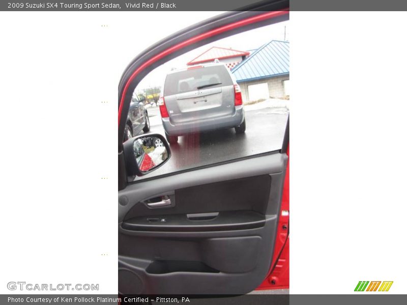 Vivid Red / Black 2009 Suzuki SX4 Touring Sport Sedan