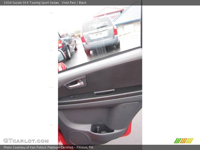 Vivid Red / Black 2009 Suzuki SX4 Touring Sport Sedan