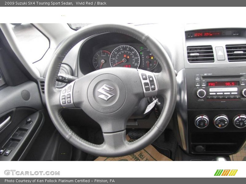Vivid Red / Black 2009 Suzuki SX4 Touring Sport Sedan