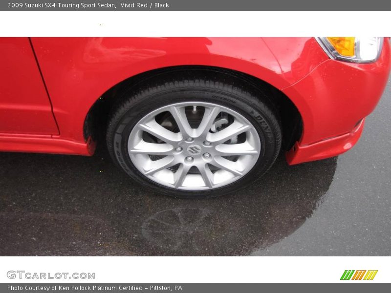 Vivid Red / Black 2009 Suzuki SX4 Touring Sport Sedan