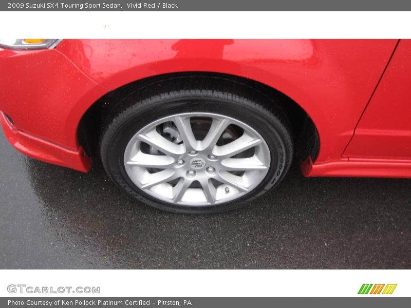 Vivid Red / Black 2009 Suzuki SX4 Touring Sport Sedan