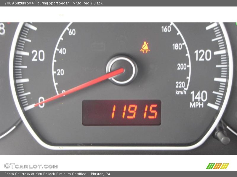 Vivid Red / Black 2009 Suzuki SX4 Touring Sport Sedan