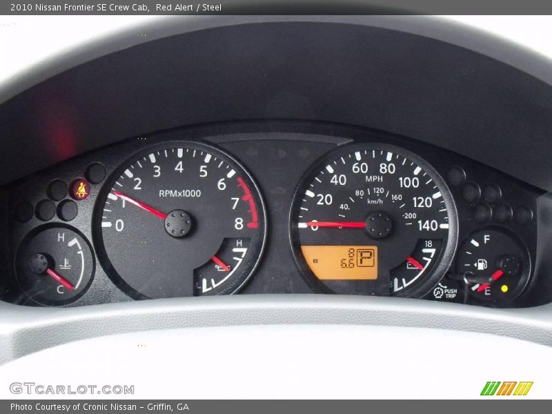 Red Alert / Steel 2010 Nissan Frontier SE Crew Cab