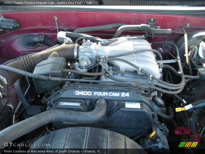 Sunfire Red Pearl / Oak 2001 Toyota Tundra Regular Cab