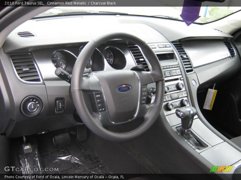 Cinnamon Red Metallic / Charcoal Black 2010 Ford Taurus SEL