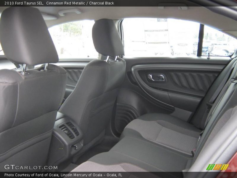 Cinnamon Red Metallic / Charcoal Black 2010 Ford Taurus SEL