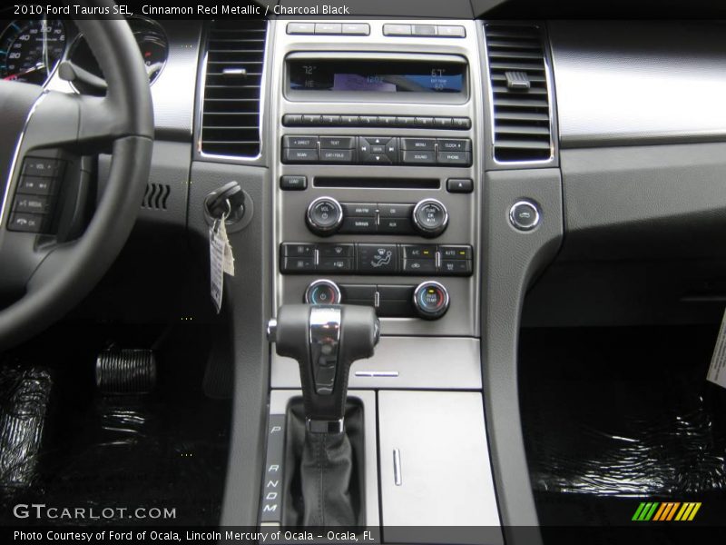Cinnamon Red Metallic / Charcoal Black 2010 Ford Taurus SEL