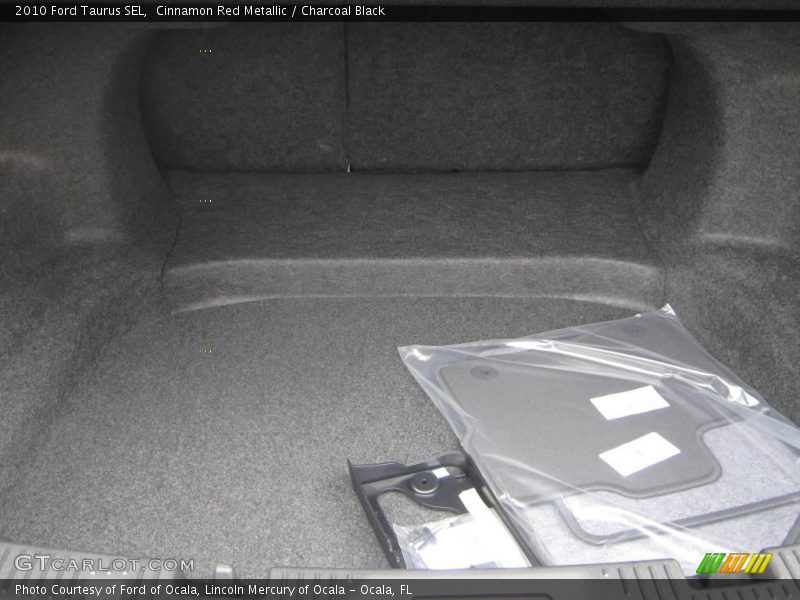 Cinnamon Red Metallic / Charcoal Black 2010 Ford Taurus SEL