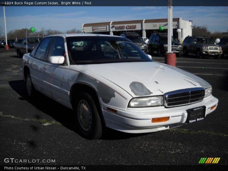 Bright White / Red 1994 Buick Regal Custom Sedan