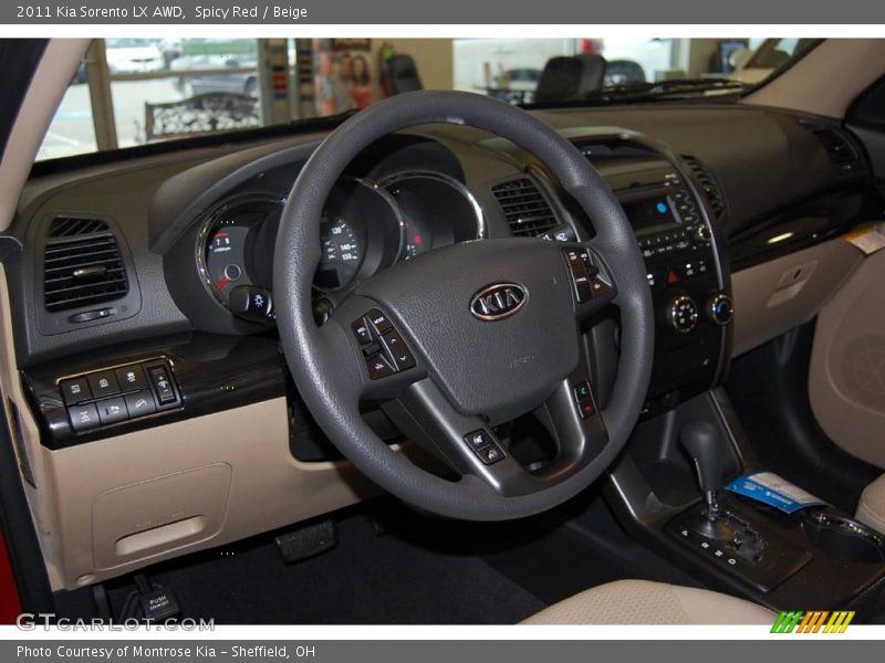 Spicy Red / Beige 2011 Kia Sorento LX AWD