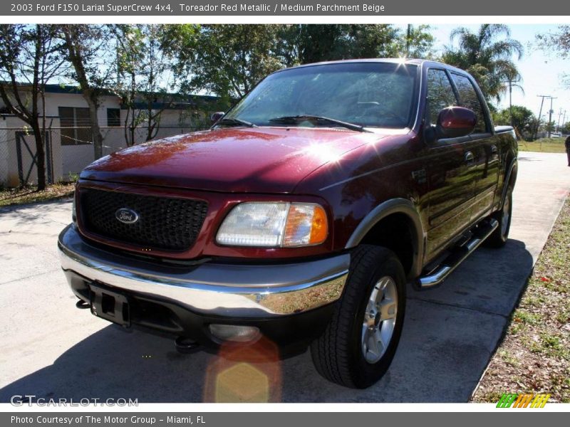 Toreador Red Metallic / Medium Parchment Beige 2003 Ford F150 Lariat SuperCrew 4x4