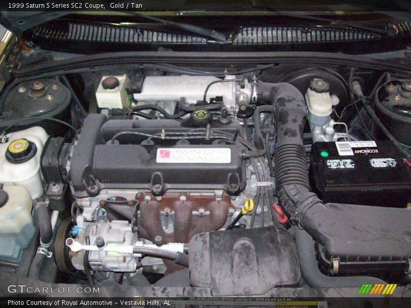 Gold / Tan 1999 Saturn S Series SC2 Coupe