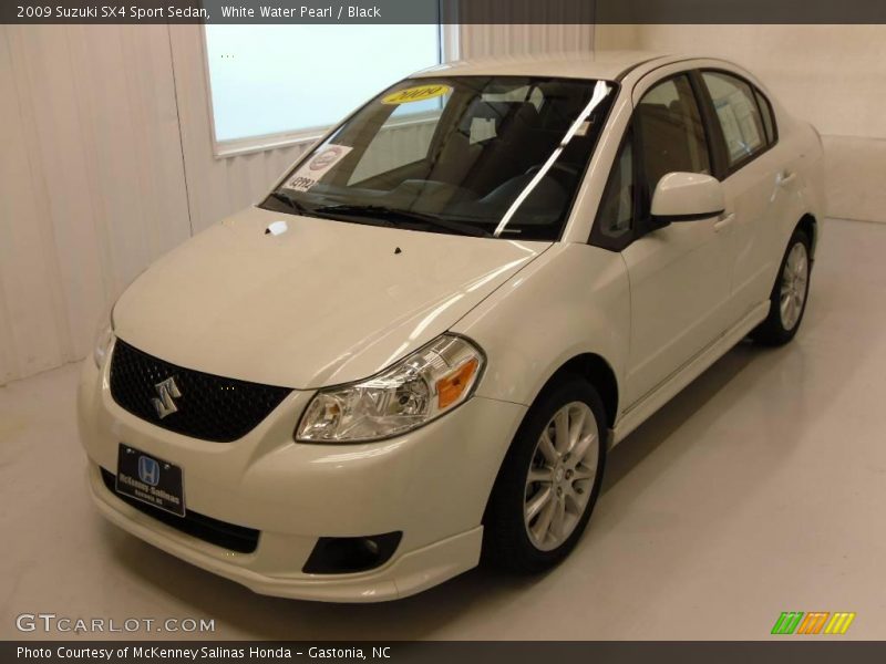 White Water Pearl / Black 2009 Suzuki SX4 Sport Sedan