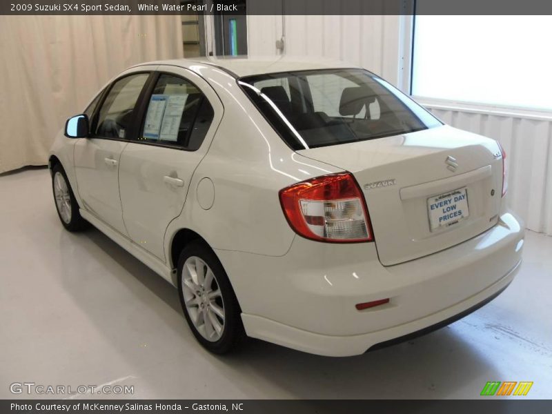White Water Pearl / Black 2009 Suzuki SX4 Sport Sedan