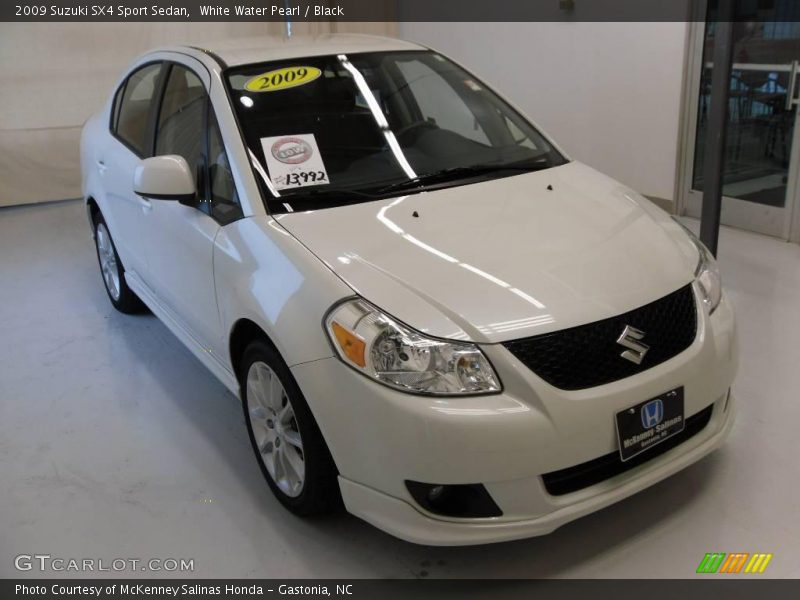 White Water Pearl / Black 2009 Suzuki SX4 Sport Sedan