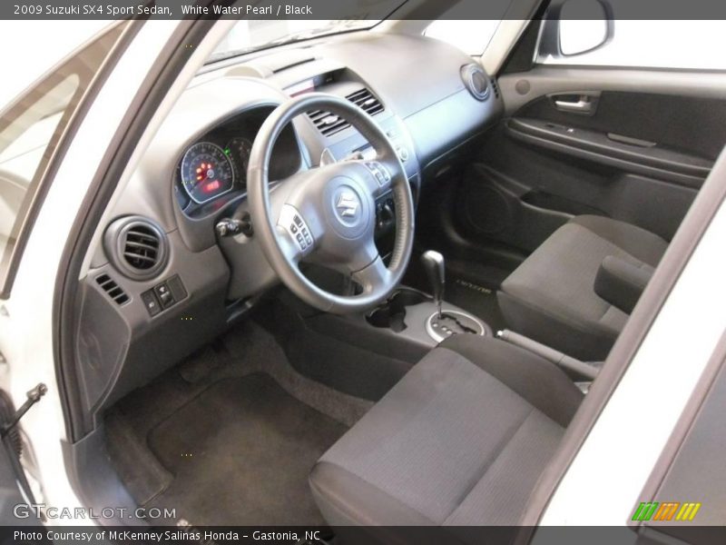 White Water Pearl / Black 2009 Suzuki SX4 Sport Sedan