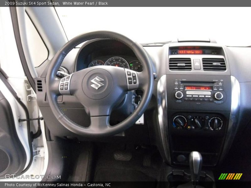 White Water Pearl / Black 2009 Suzuki SX4 Sport Sedan