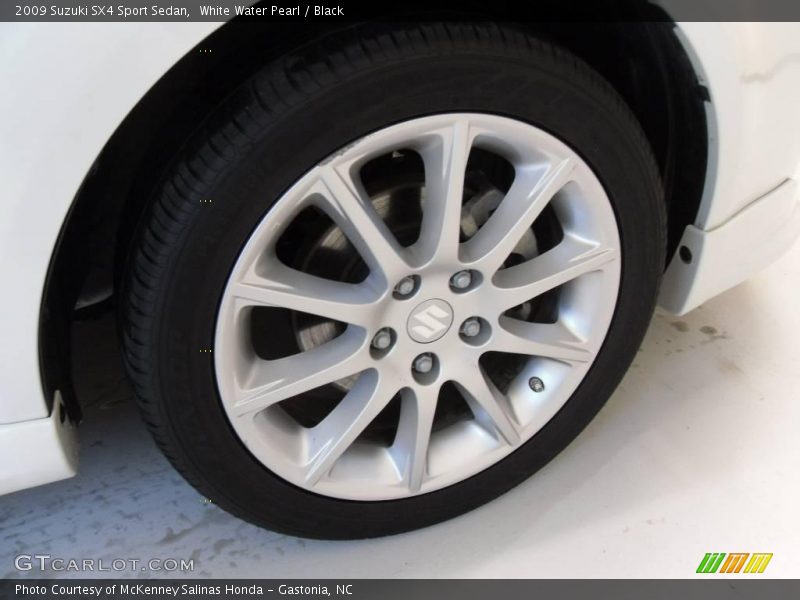 White Water Pearl / Black 2009 Suzuki SX4 Sport Sedan