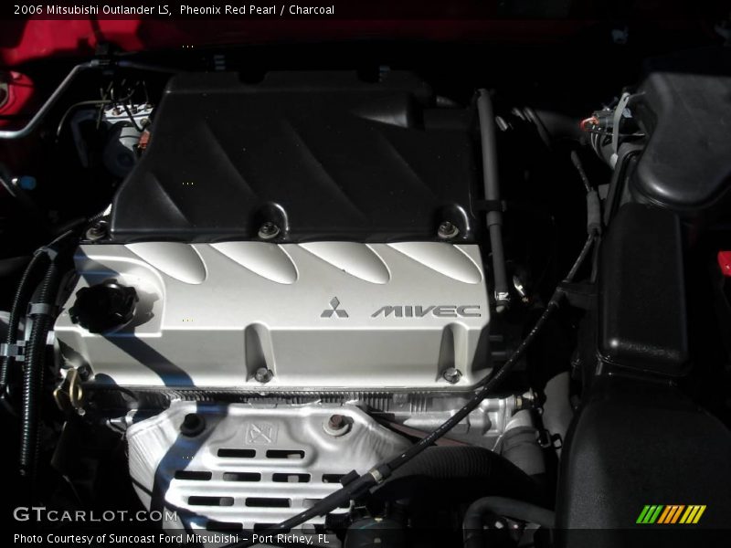 Pheonix Red Pearl / Charcoal 2006 Mitsubishi Outlander LS