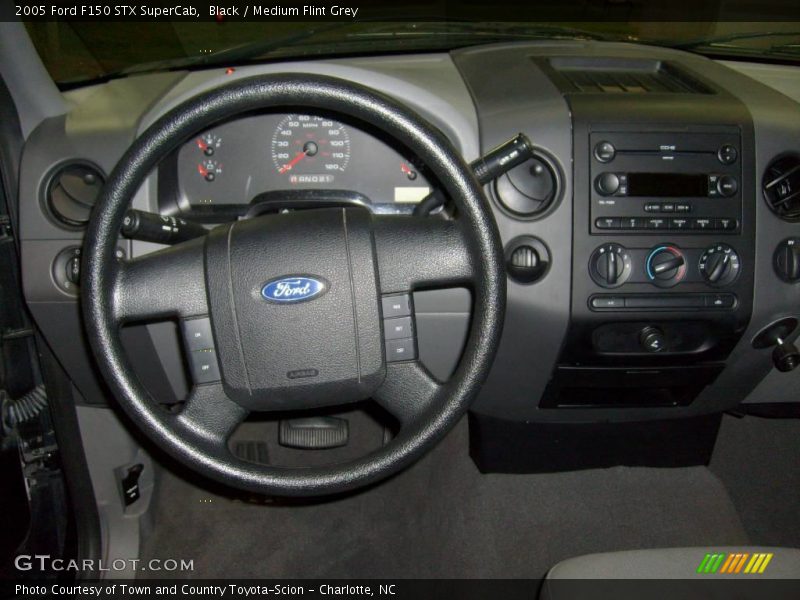 Black / Medium Flint Grey 2005 Ford F150 STX SuperCab