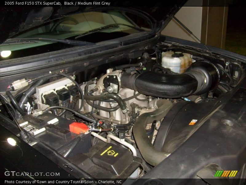 Black / Medium Flint Grey 2005 Ford F150 STX SuperCab
